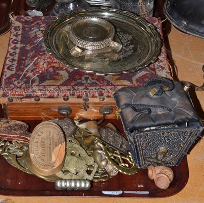 Lot 141 - A silver ashtray, six others set with Indian coins, each stamped 'silver', horse brasses, belt...