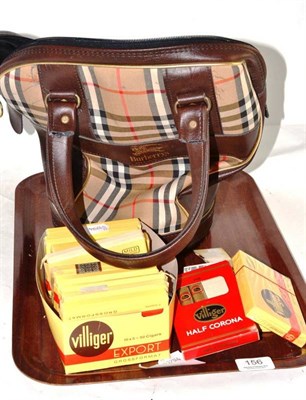 Lot 156 - A Burberry golf ball bag and a quantity of cigars