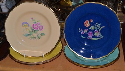 Lot 157 - A harlequin set of six Spode plates painted with floral sprays, signed A Ball