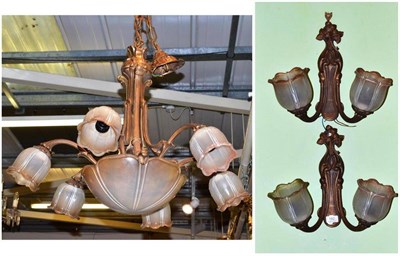 Lot 182 - An Art Nouveau style six branch ceiling light and a pair of matching wall lights