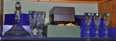 Lot 193 - A shelf of crystal glassware, mostly Edinburgh crystal including champagne flutes, cased sets...