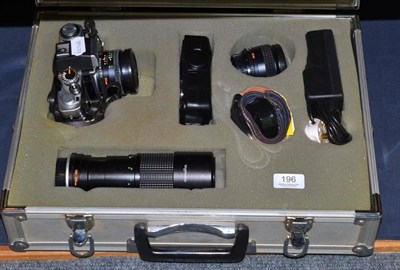 Lot 196 - A Minolta cased camera, two lenses and other items