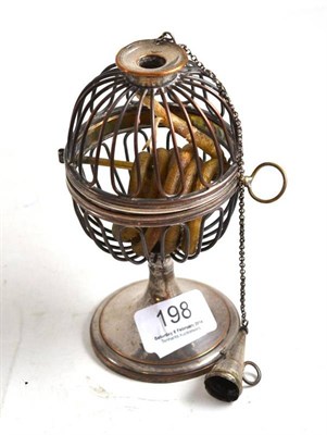 Lot 198 - An Old Sheffield plate wax jack of unusual form with a cage