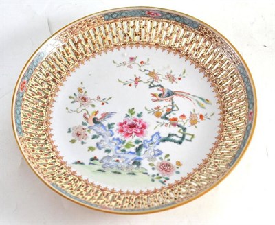 Lot 199 - An 18th century Chinese famille rose plate with pierced border (restored)