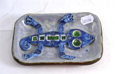Lot 201 - A studio pottery dish decorated with a lizard bearing fake Troika marks