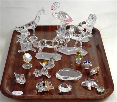 Lot 217 - A quantity of Swarovski ornaments including; school of fish; camel; flamingo; Disney Lion King...