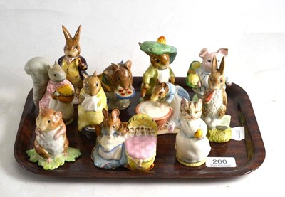 Lot 260 - Four Beswick Beatrix Potter figures, all BP2a: Hunca Munca, Appley Dapply, Benjamin Bunny,...