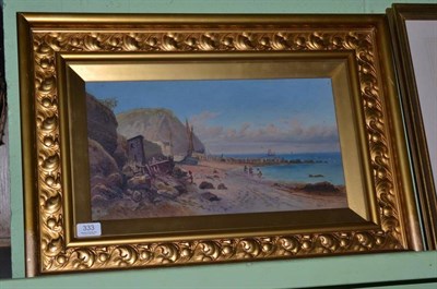 Lot 333 - B E Lockwood, (early 20th century) children playing in the sea, signed oil on board