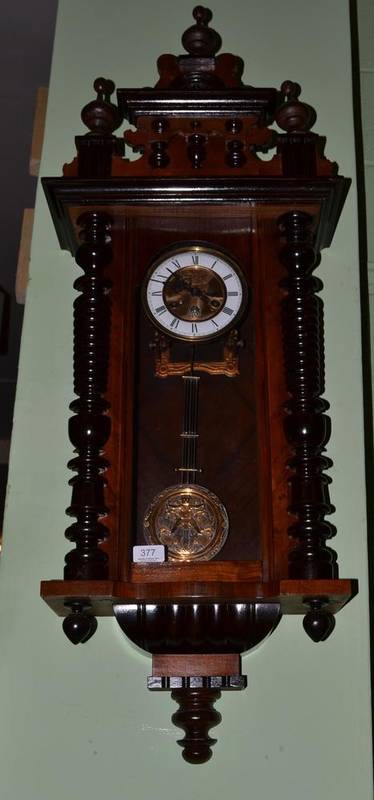 Lot 377 - A Vienna type striking wall clock