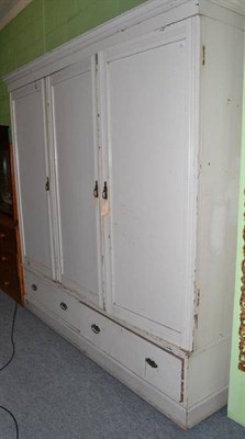 Lot 381 - Victorian painted pine three door wardrobe with two drawers below