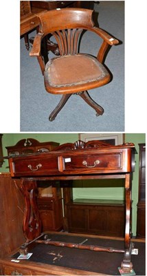 Lot 399 - A mahogany two drawer washstand and oak captains chair (2)