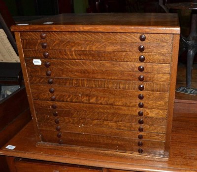 Lot 401 - Oak fourteen drawer medal collector's cabinet
