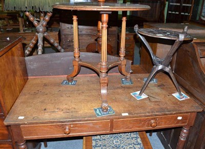 Lot 410 - A Victorian burr walnut occasional table, an oak side table and an African table (3)