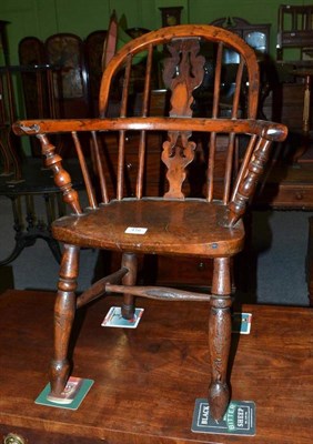 Lot 416 - Yew and elm child's Windsor chair