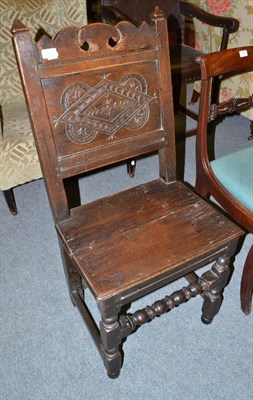 Lot 430 - An 18th century oak chair