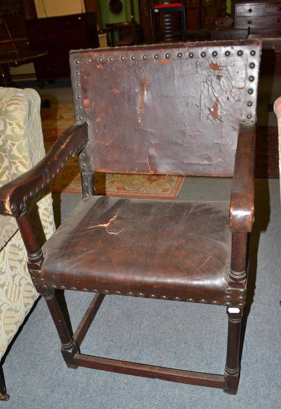 Lot 432 - Leather upholstered armchair