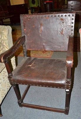 Lot 432 - Leather upholstered armchair
