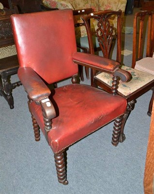 Lot 433 - A leather covered armchair and a George III mahogany dining chair with drop-in seat carved...