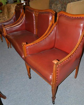 Lot 444 - Edwardian inlaid mahogany three piece suite comprising double settee and two armchairs