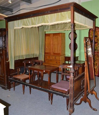 Lot 467 - A mahogany four poster bed