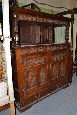 Lot 468 - A 19th century carved oak court cupboard in 17th century style