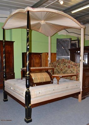 Lot 470 - A modern four poster bed with chinoiserie style canopy and headboard, with shaped mattress