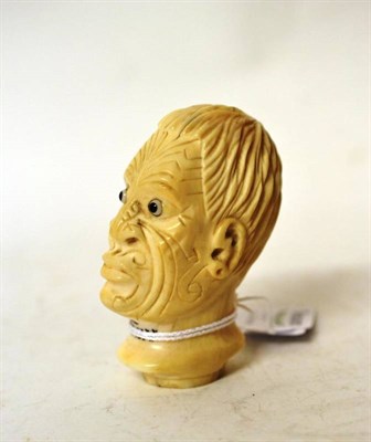 Lot 254 - A Carved Ivory Cane Handle as a Maori Head, circa 1900, inscribed To Mary, well detailed and...