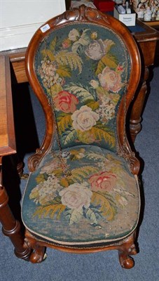 Lot 495 - Victorian nursing chair with walnut frame and needlework panels