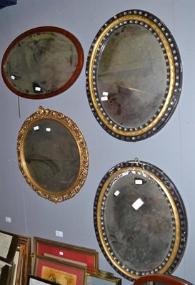 Lot 522 - A toilet mirror and four wall mirrors