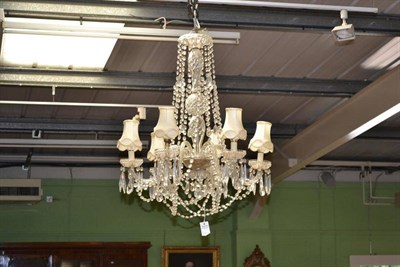 Lot 261 - A Cut Glass Six-Branch Chandelier, 20th century, the central hollow multiple knopped stem to a dish