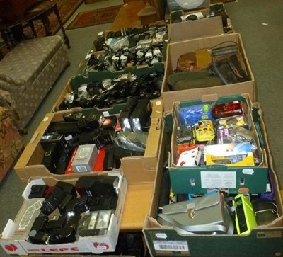 Lot 571 - A large collection of cameras and accessories, including a quantity of 35mm cameras, bound...