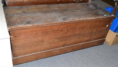 Lot 572 - A wide vintage pine trunk with hinged lid