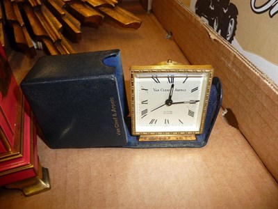 Lot 594 - A cased travelling alarm clock bearing inscription Van Cleef and Arpels, a Japanned mantel...