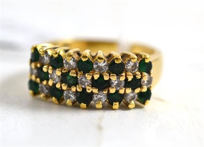 Lot 15 - An emerald and diamond three row ring stamped ";14K"