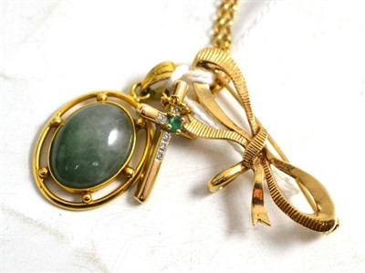 Lot 17 - A 9ct gold bow brooch, a jade type pendant and an emerald and diamond cross on chain