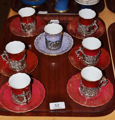 Lot 52 - Seven Coalport coffee cups with silver mounts