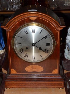 Lot 55 - An Edwardian mahogany inlaid striking mantel clock