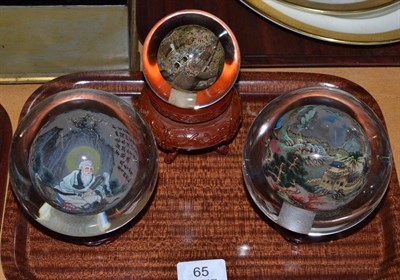 Lot 65 - Three 20th century Chinese reverse painted glass paperweights