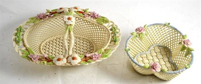 Lot 66 - A modern Belleek lattice basket signed to base and another similar