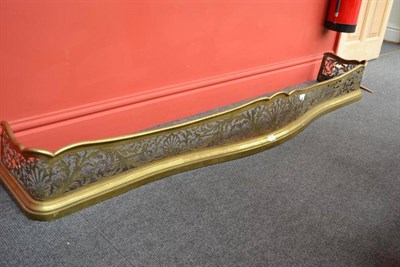 Lot 275 - A Late 19th Century Fretted Brass Serpentine Fronted Fire Fender, in George III style, with moulded