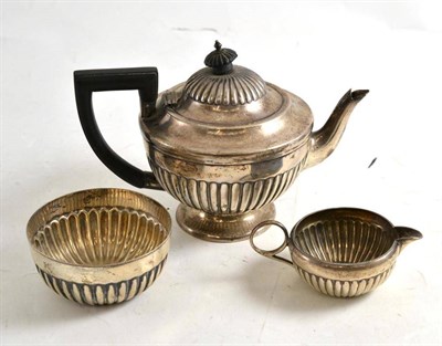 Lot 77 - A silver three piece tea set for one