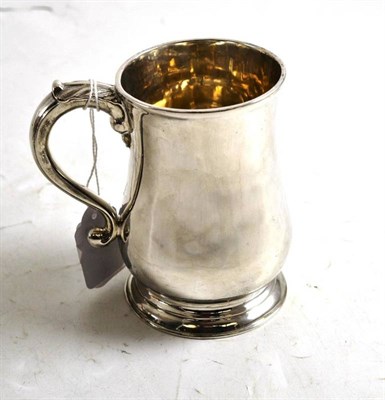 Lot 82 - A George III silver baluster mug, London, probably 1779