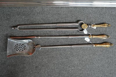 Lot 277 - A Set of Three William IV Brass Mounted Polished Steel Fire Irons, each grip as stylised leaves...