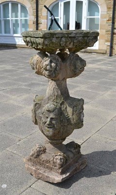 Lot 279 - A 19th Century Carved Stone Sundial, dated 1830, decorated with grotesque and lion head masks above