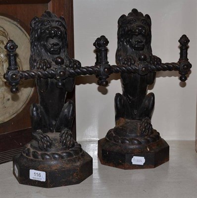 Lot 116 - Pair of Victorian cast iron lion fire dogs