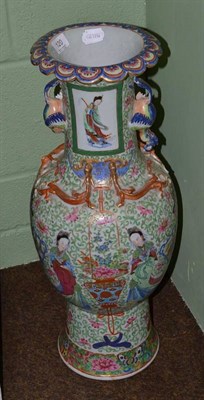 Lot 120 - A late 19th century Chinese famille rose baluster vase, decorated with female figures amongst a...