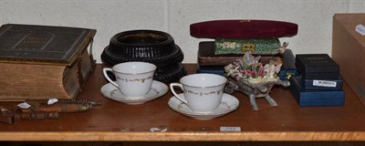 Lot 133 - Four knitting sheaths, family bible, two cast iron spittoons, cased plated flatware etc