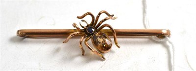 Lot 151 - An early 20th century sapphire and citrine set spider bar brooch