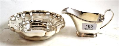 Lot 165 - A silver rose shaped dish and a small sauceboat