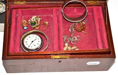 Lot 168 - A 9ct gold horseshoe brooch, a gold and coral ring, two silver bangles, pocket watch and...